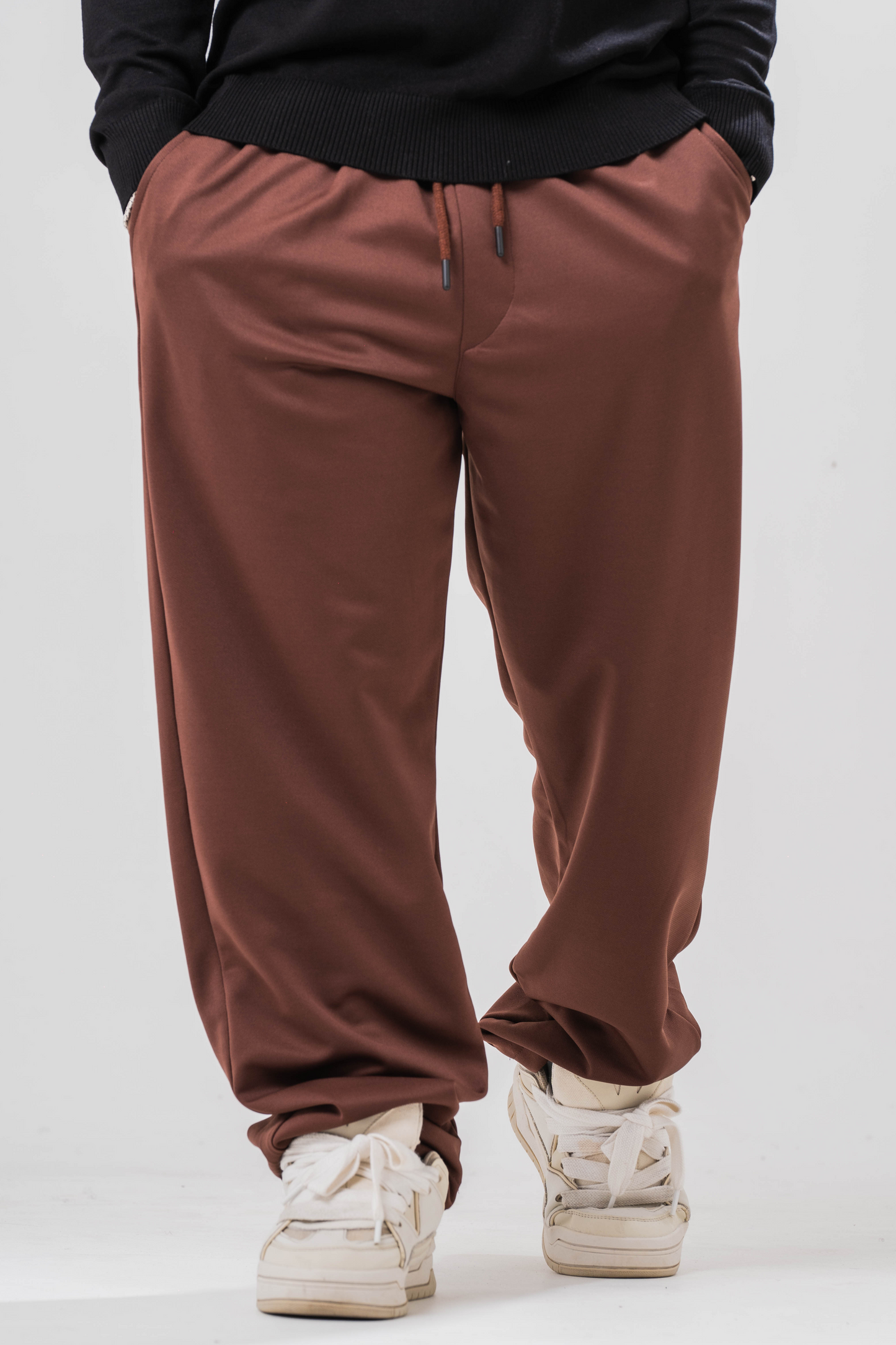 Sonder relaxed sweatpants in brown. Front image 