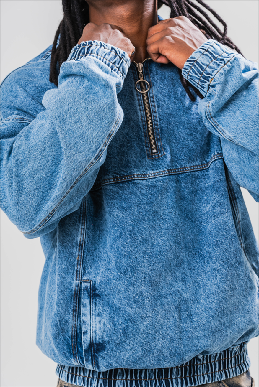 Close up view of Male model wearing our Denim Quarter Zip Pullover