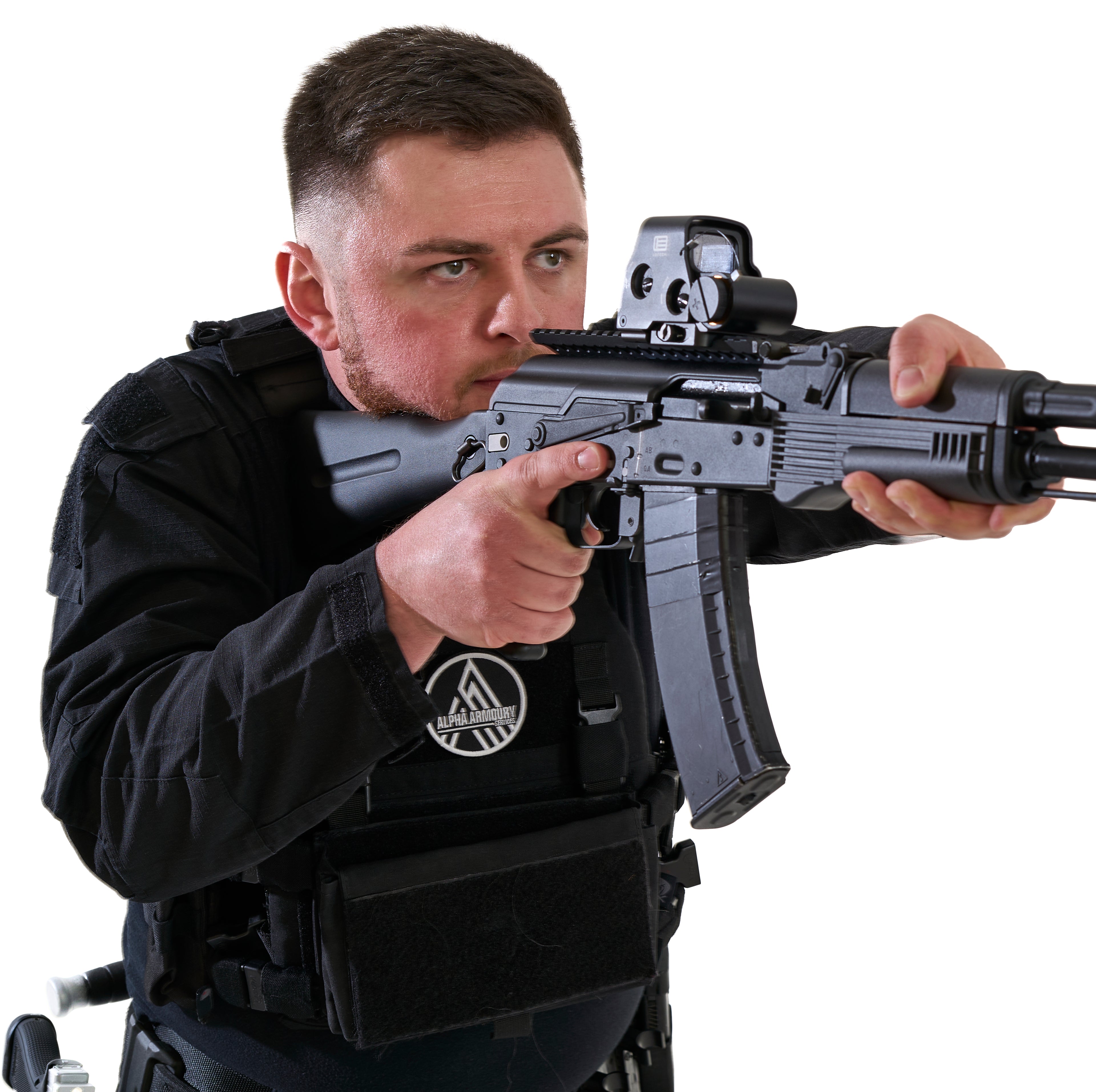 Man holding a rifle with a scope on a white background