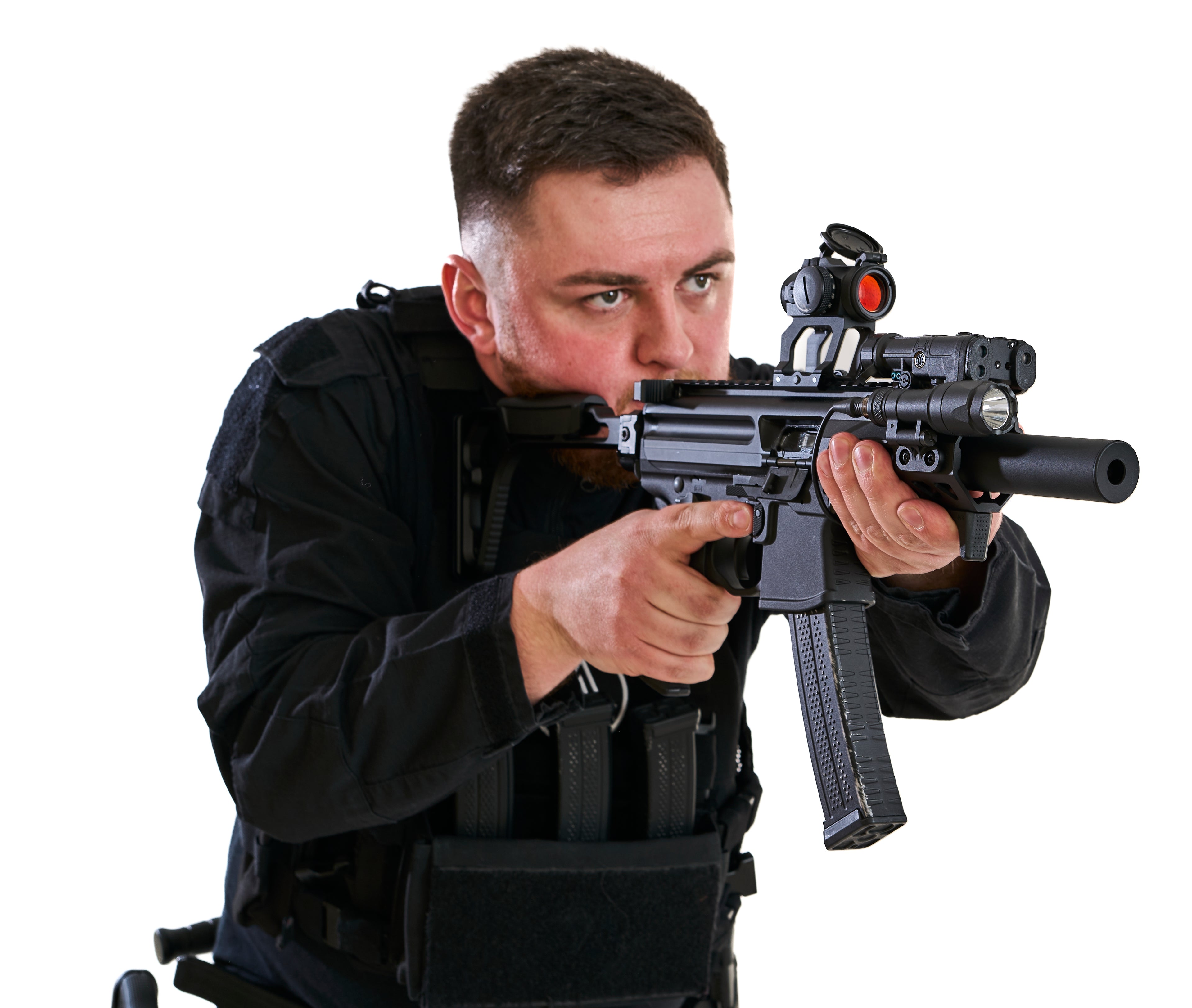 Man in tactical gear holding a MP5 submachine gun with a white background